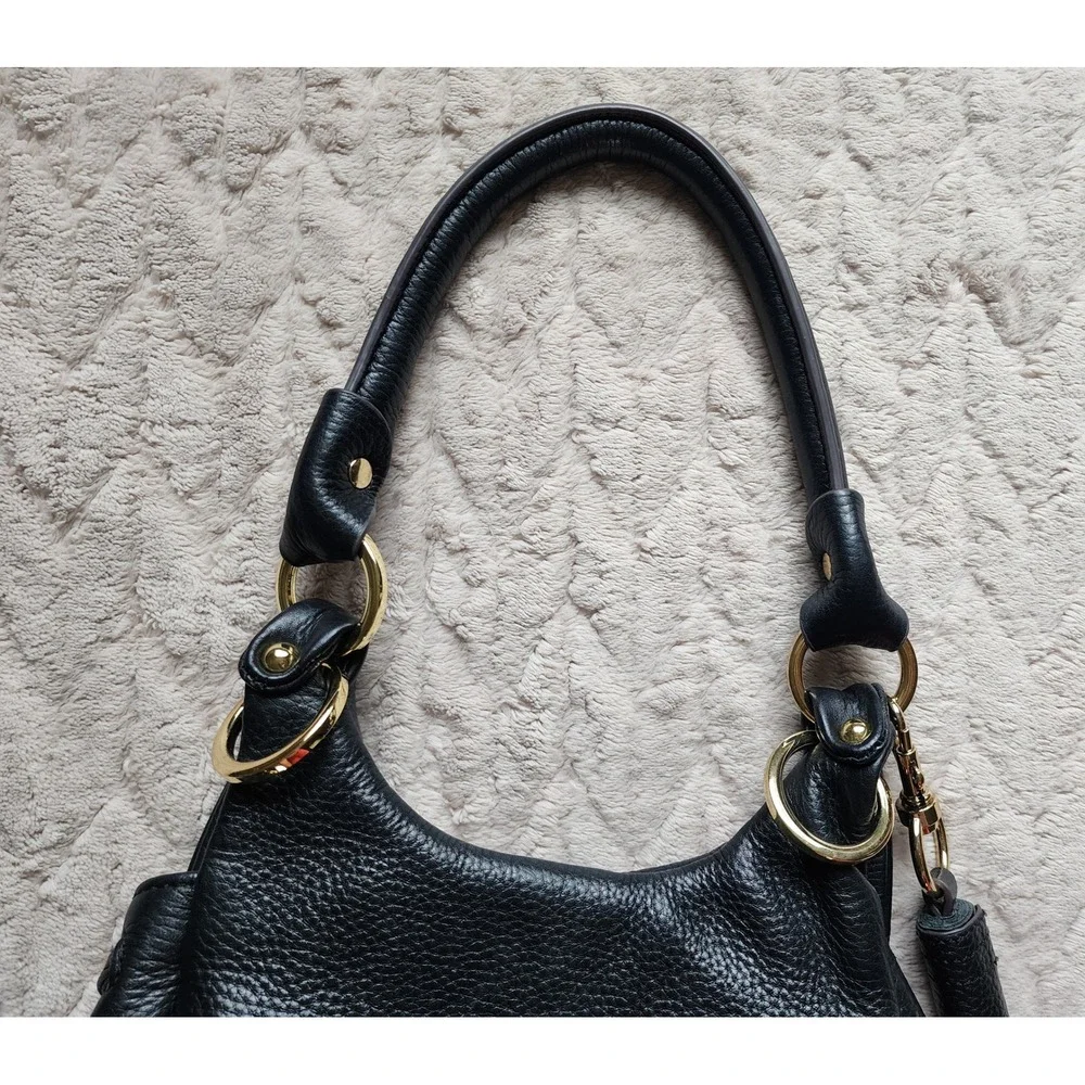 Gili Black Pebbled Leather Shoulder Bag Gold Stirrup Tassel Purse